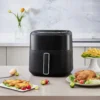 Upgrade your kitchen with. KOMORE  6L Digital Air Fryer is a game changer for healthier and fast cooking. Designed with advanced 360° hot air circulation, it delivers crispy, golden results with up to 80% less oil, making every meal guilt-free and delicious. The intuitive LED touchscreen offers effortless control, while multiple preset cooking modes take the guesswork out of meal prep. With an adjustable temperature range of 80°C-200°C  and a built-in timer, you can fry, bake, roast, and reheat with precision. Its spacious capacity allows you to cook family-size portions, while the non-stick, dishwasher-safe basket ensures easy cleanup. Whether you are making crispy fries, juicy chicken, or roasted vegetables, the KOMORE  6L Digital Air Fryer provides a seamless efficient cooking experience perfect for busy households. CE, UKCA certified for quality and reliability. For more details, visit our [Compliance certifications].